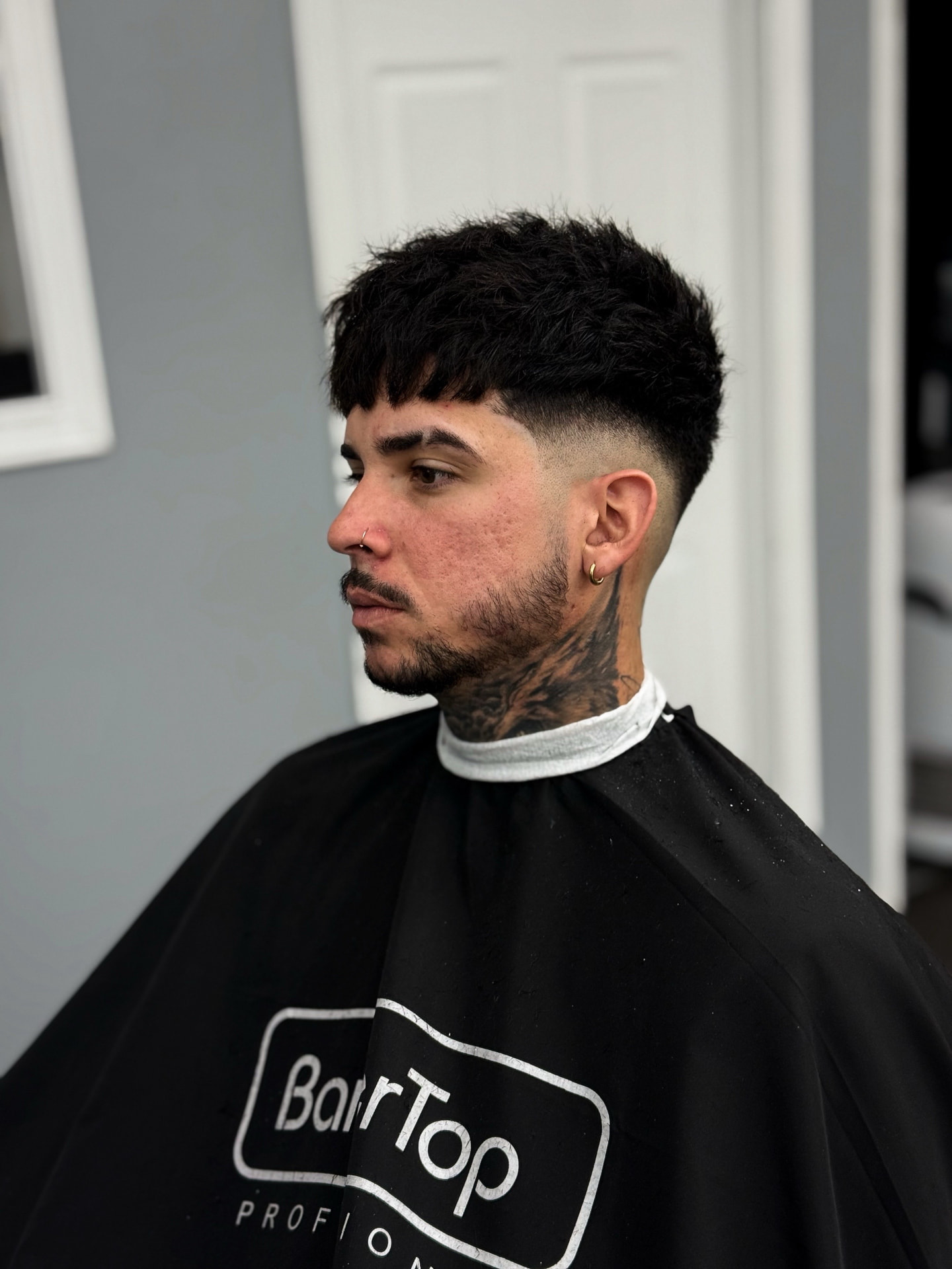 Mid fade with a textured fringe