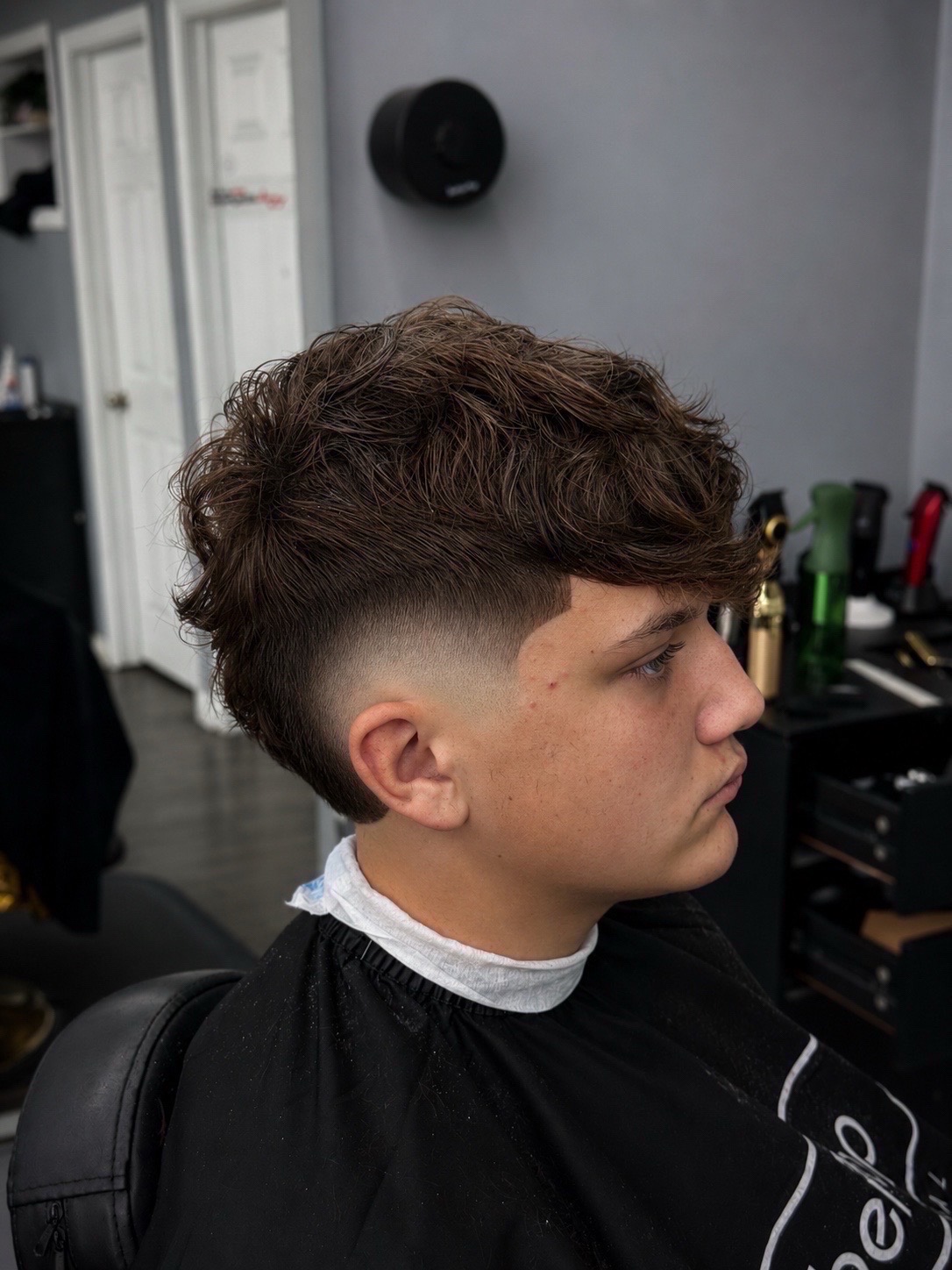 Low fade with a fluffy textured top